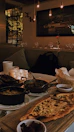 A beautifully set dining table with authentic Kashmiri dishes served on the houseboat.