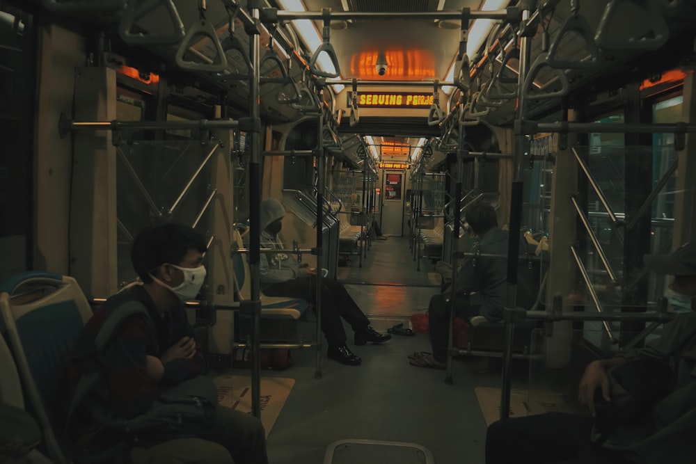 people sitting on bus seat