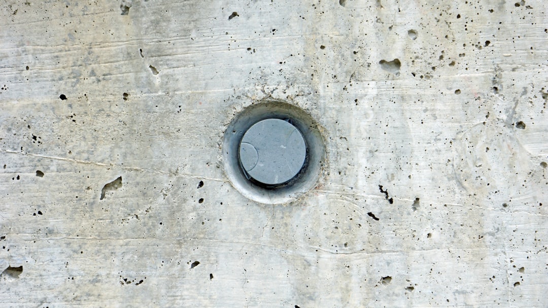 round hole on gray wooden surface