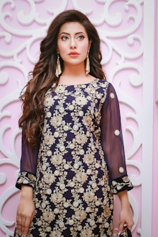 woman in black and white floral dress