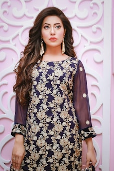 woman in black and white floral dress