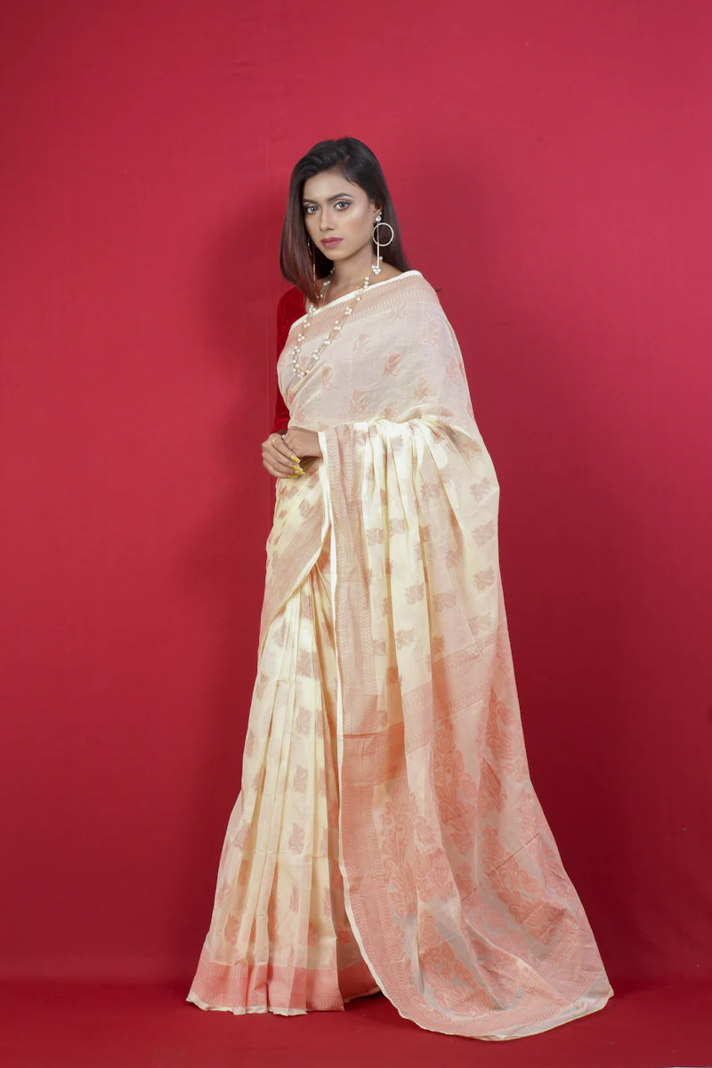 A woman in a white and pink floral outfit