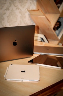 An elegant workspace with minimalist decor and a digital tablet.