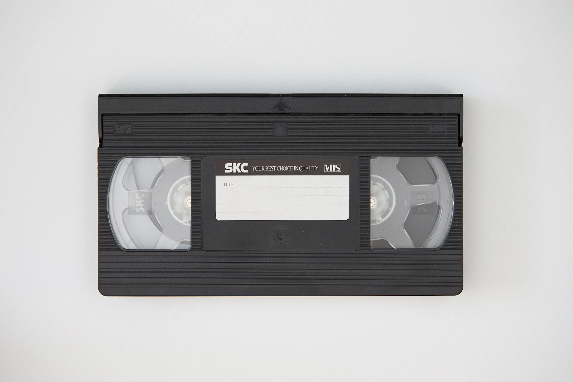black cassette tape on white textile