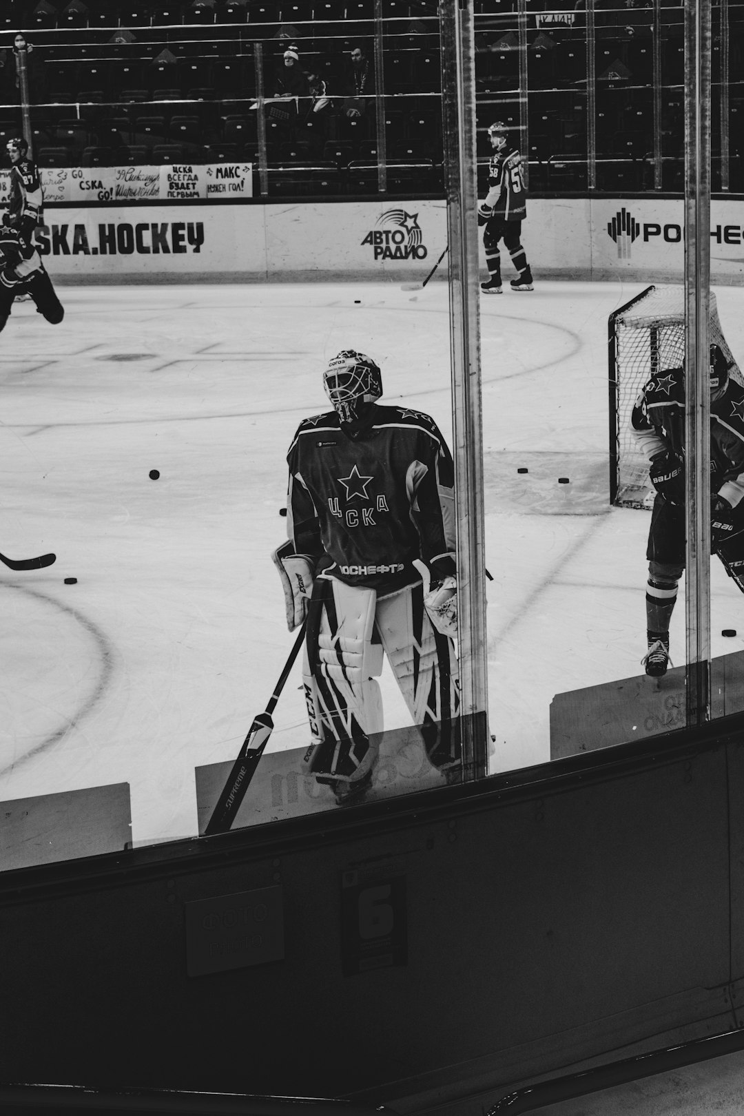 ice hockey players on ice hockey field