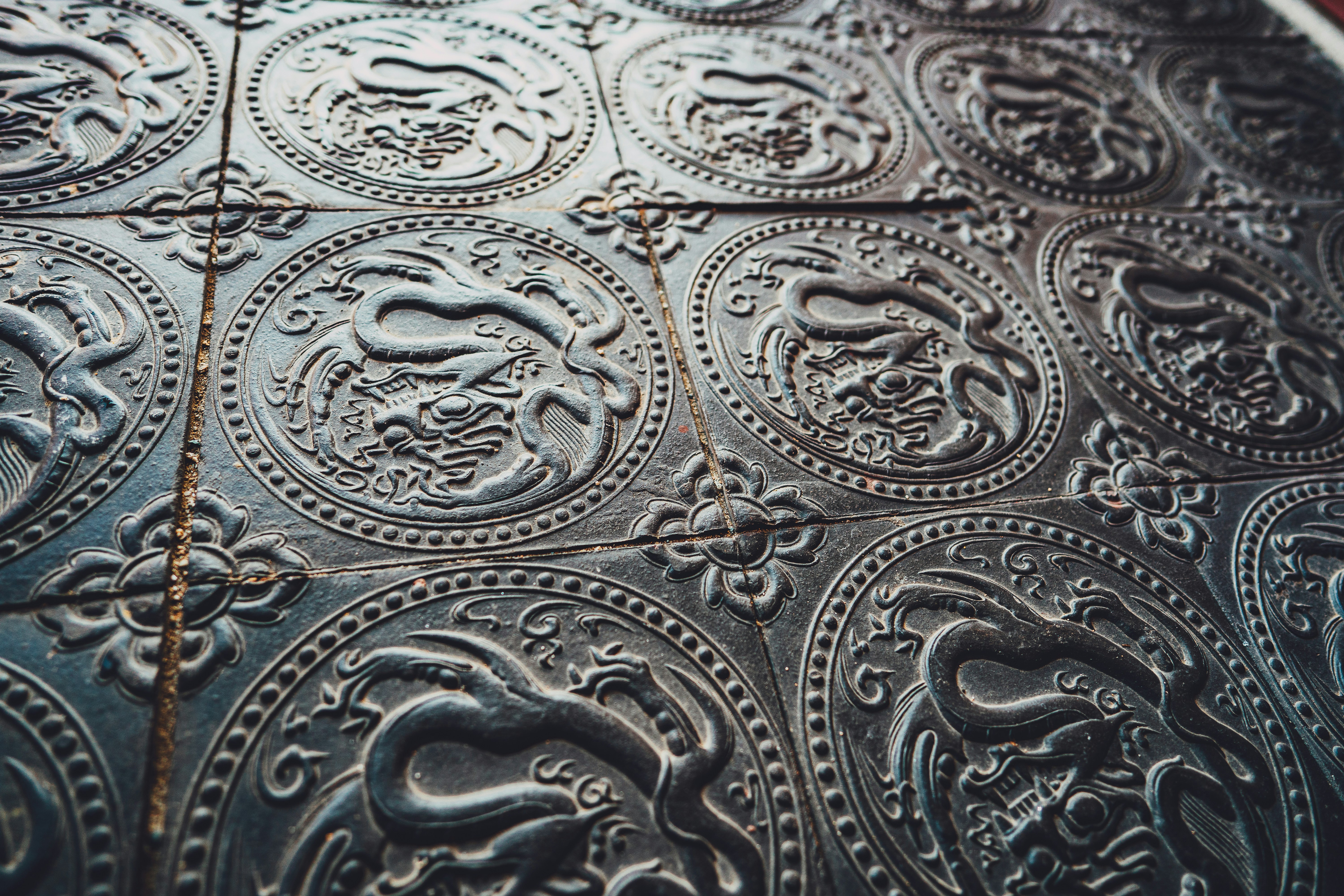 white and black floral textile