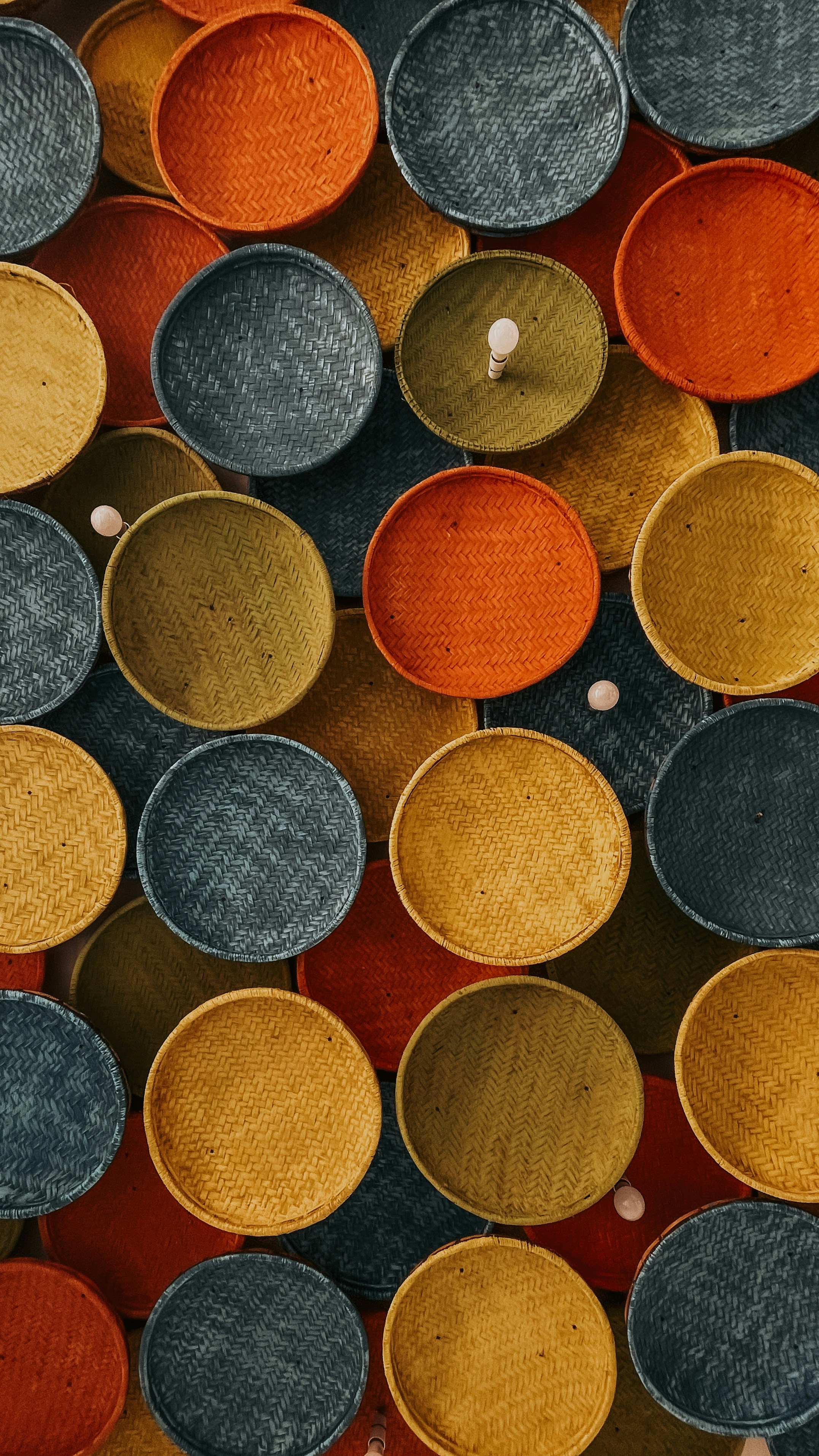 orange blue and gray round plastic cups