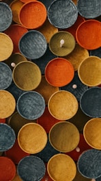 A collection of beautifully woven baskets showcasing various colors and patterns.