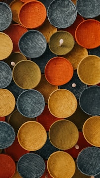 A collection of beautifully woven baskets showcasing various colors and patterns.