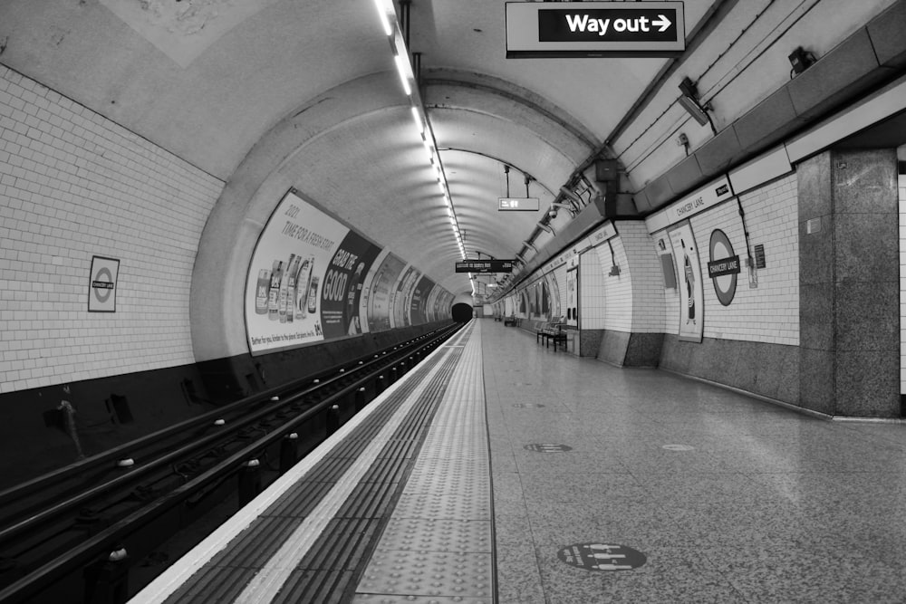 grayscale photo of train station