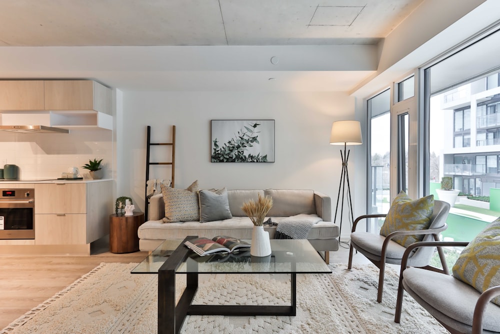 black wooden coffee table near white sofa