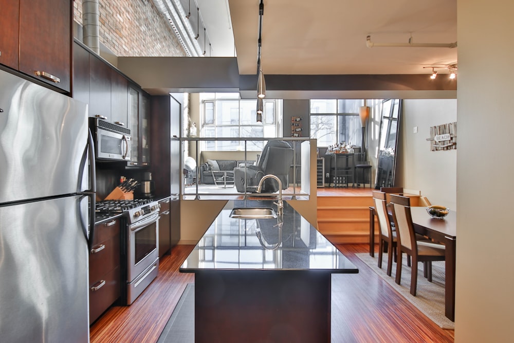 brown wooden table and chairs