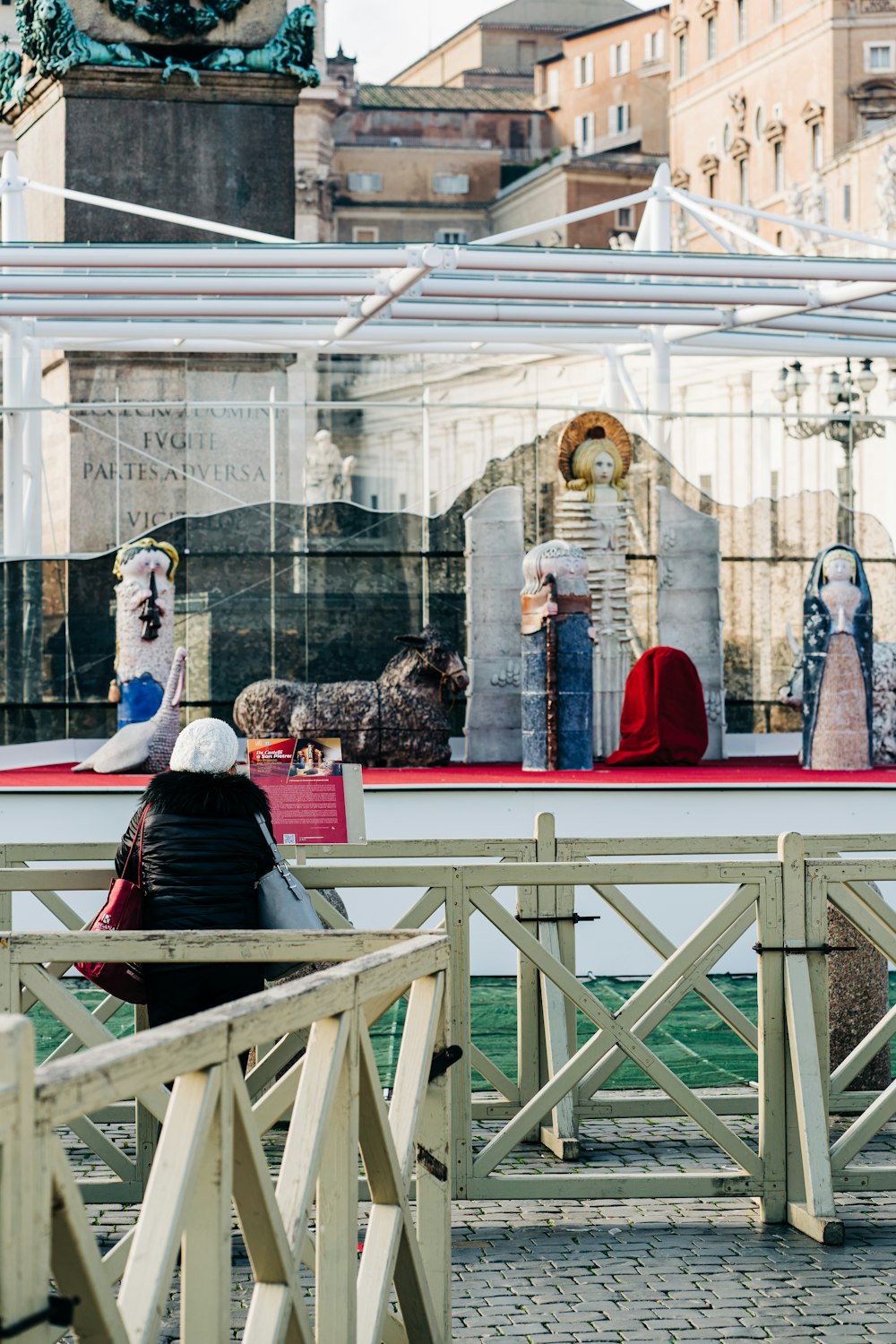 people in front of a glass window