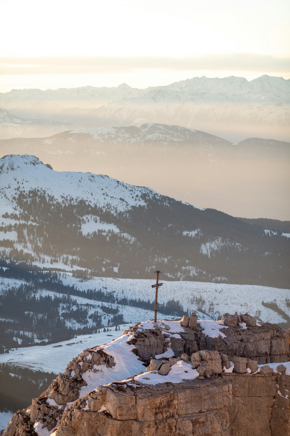 snow covered mountain during daytime