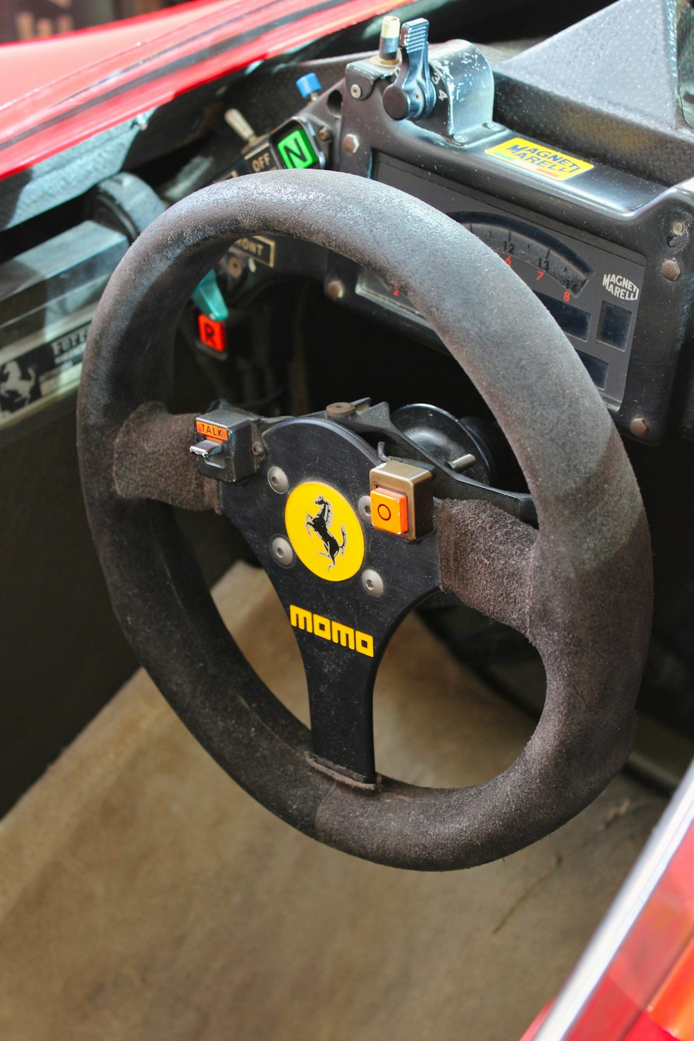 black and yellow car steering wheel