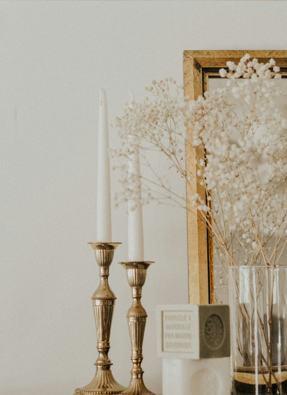 gold and white candle holder