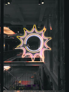 A bright, minimalist storefront bathed in warm yellow light, symbolizing the bright and trustworthy vibe of The Sunny Day brand.