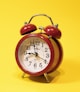 red and white alarm clock