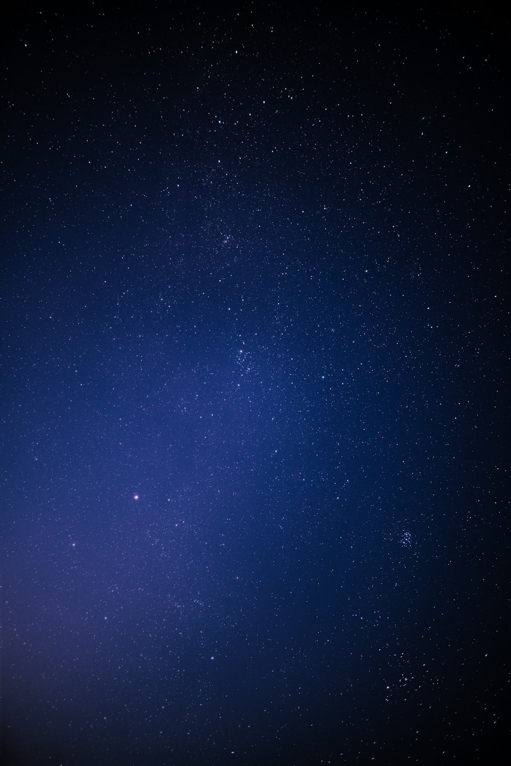 blue sky with stars during night time