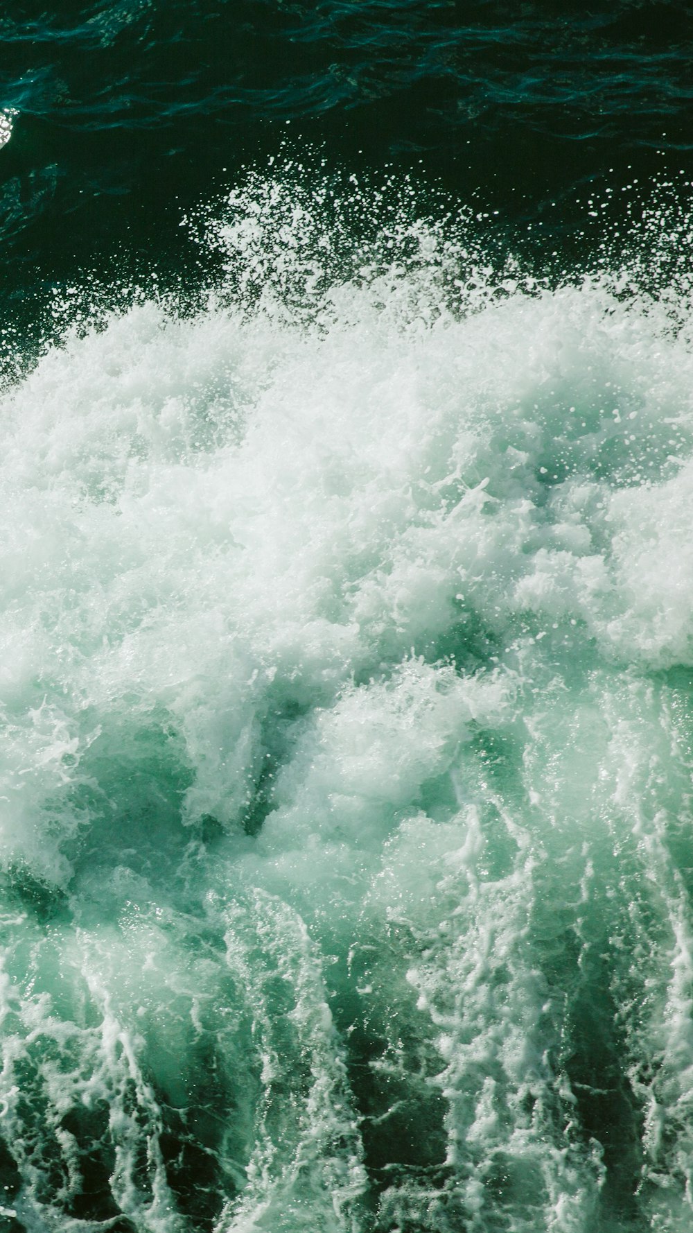 white and green water waves