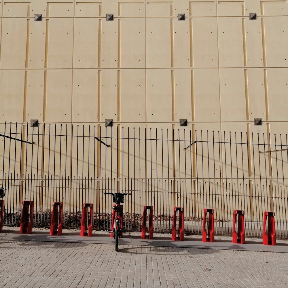 red fire hydrant on gray concrete floor