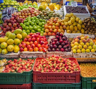 red and green apples on red plastic crate