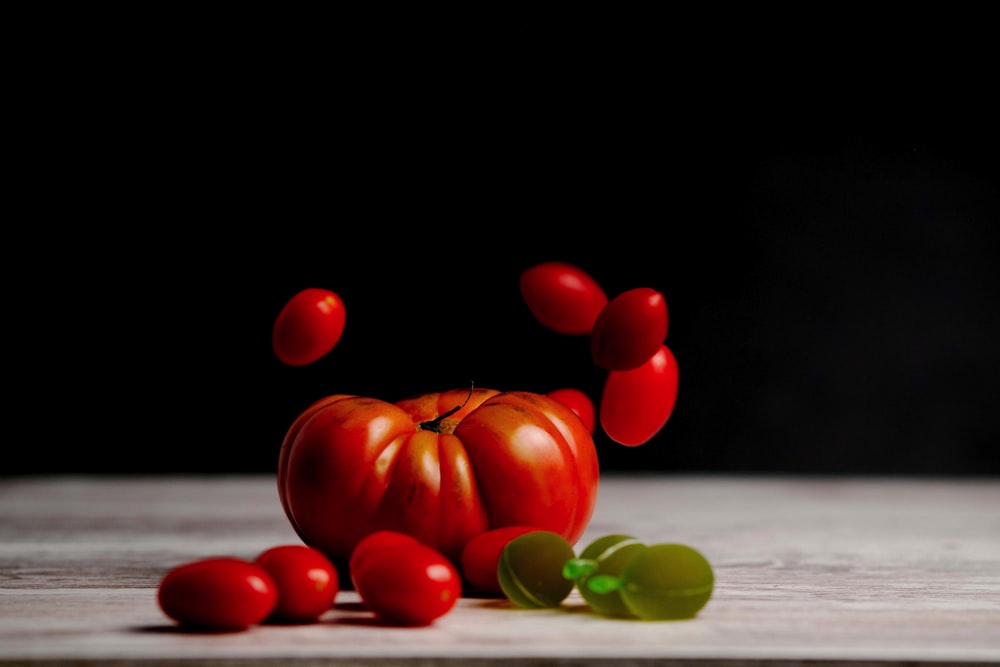 orange tomato on white table