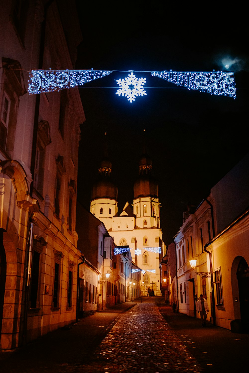 white string lights on street during night time