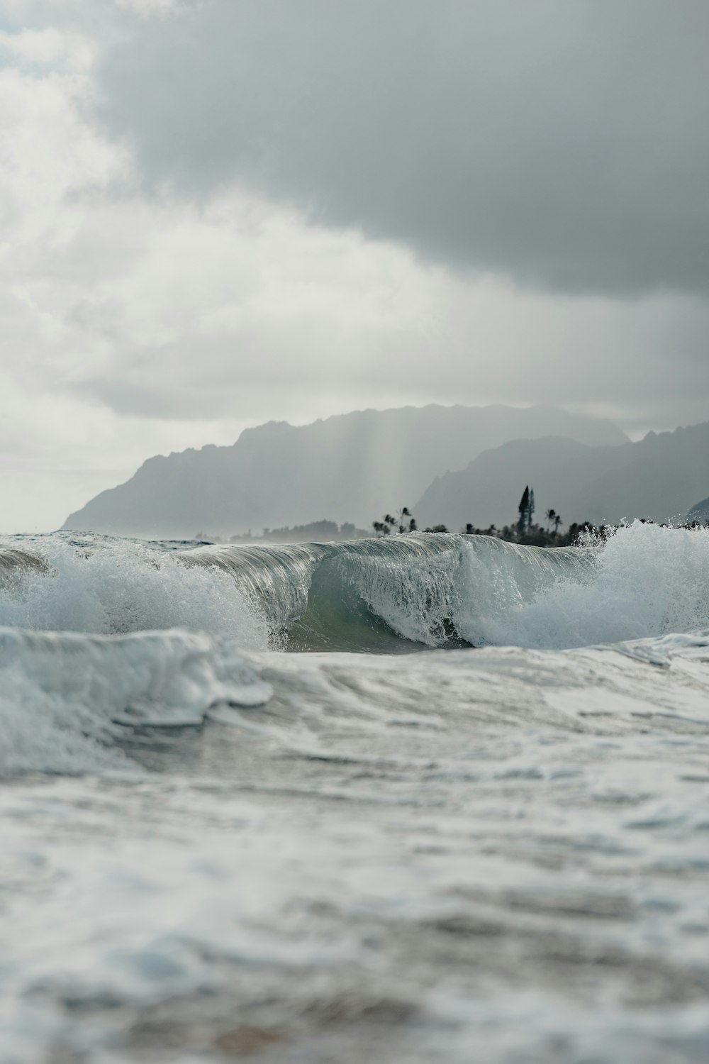 person surfing on sea waves during daytime