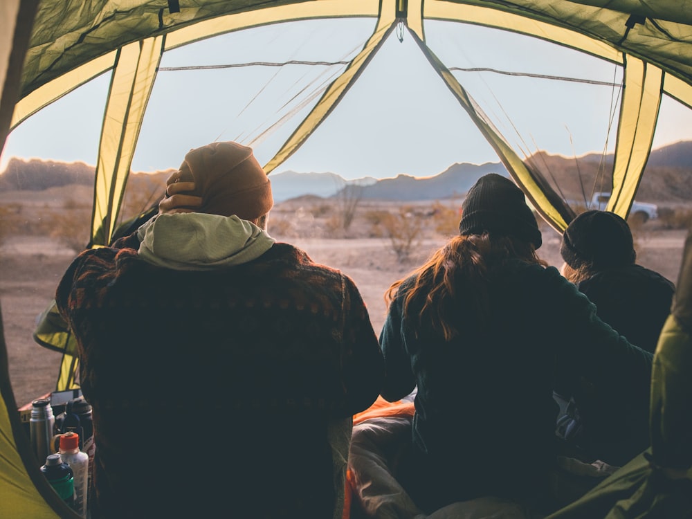 people in tent during daytime