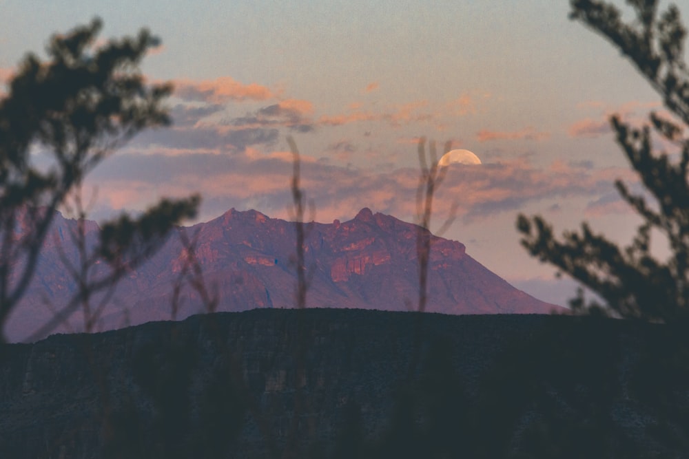 silhouette of mountain during sunset