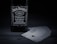 A bottle of Jack Daniel's Tennessee Whiskey displayed next to a spread of playing cards. The arrangement is set on a dark, wooden surface, accentuating the black and white label of the whiskey and the suits on the playing cards.