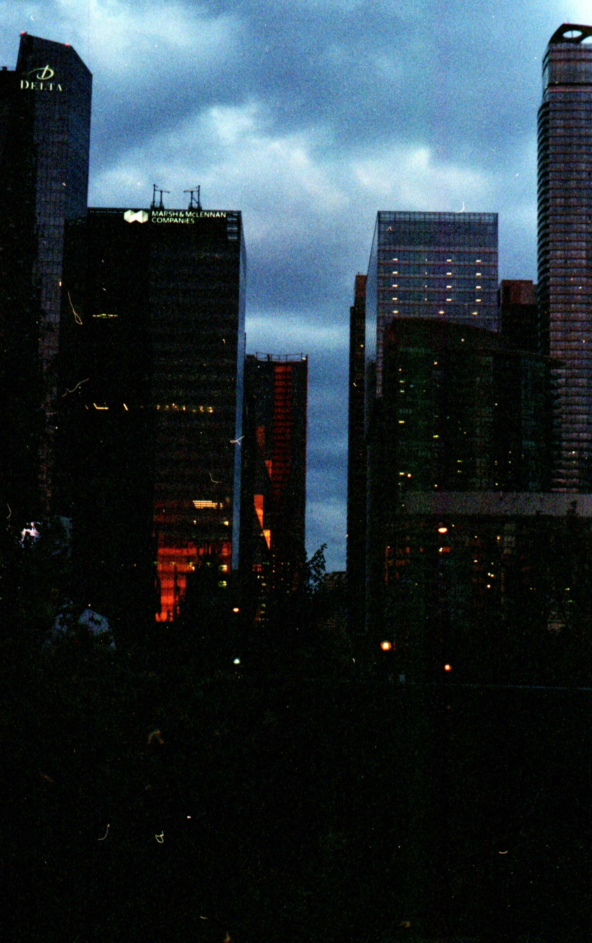 city skyline during night time