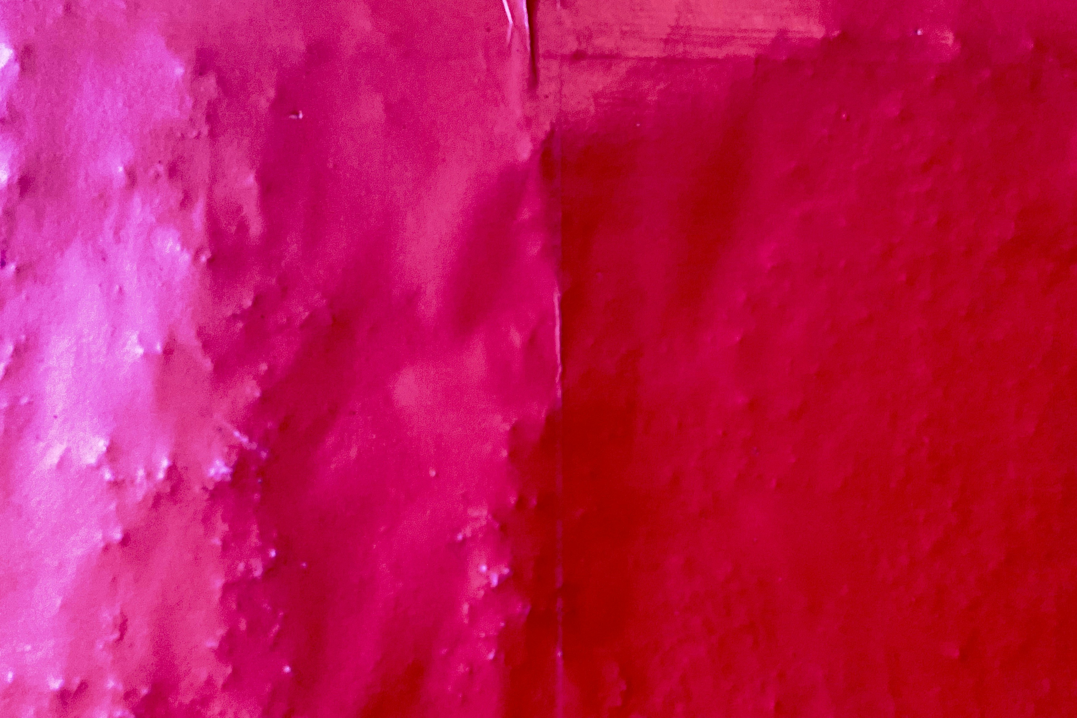 red textile on white textile