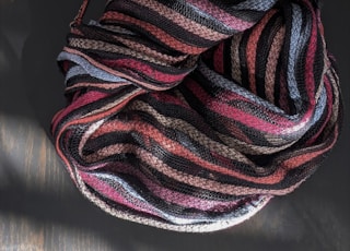 red and black striped textile