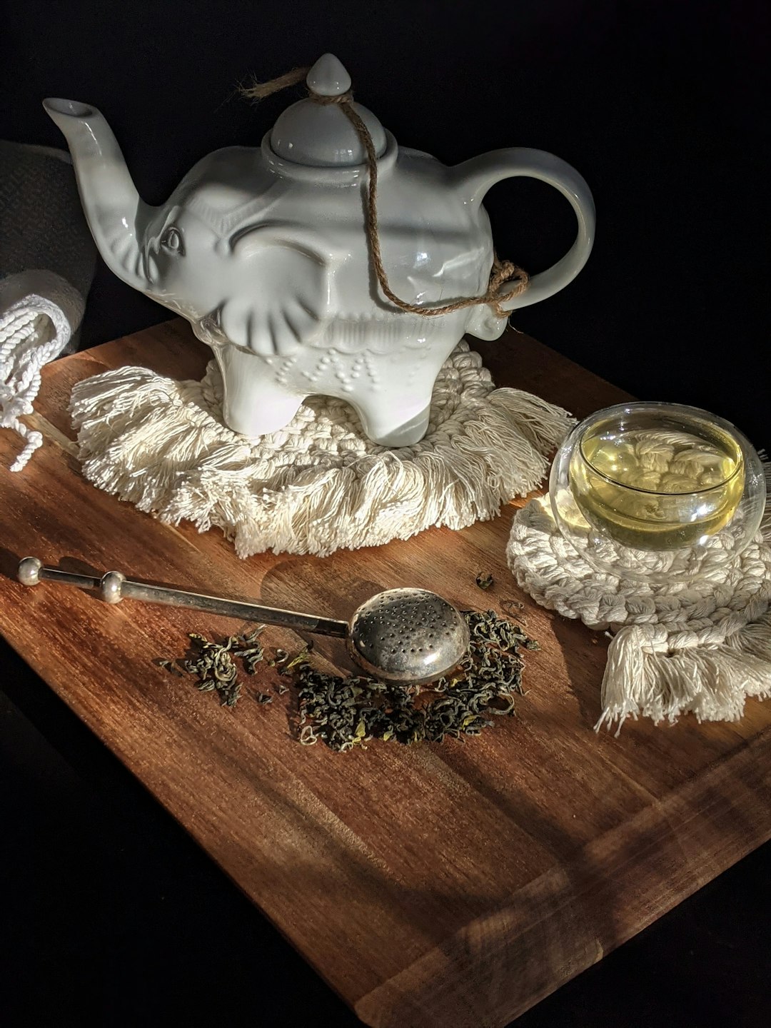 white ceramic teapot on brown wooden table