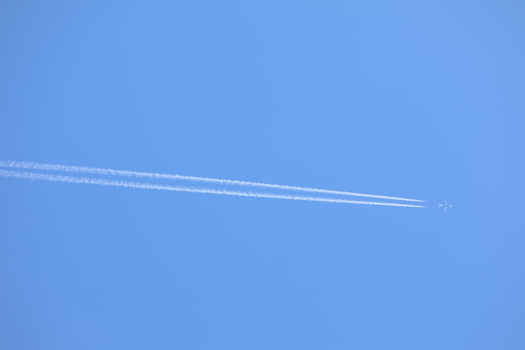 white string on blue sky