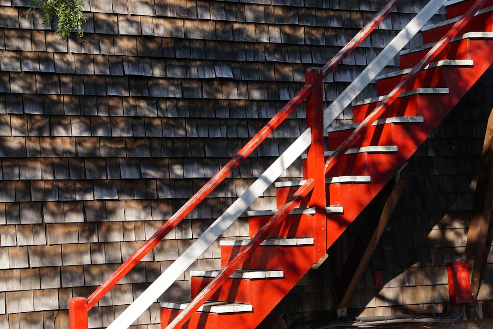 red and brown wooden staircase