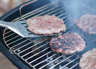 brown meat on black grill