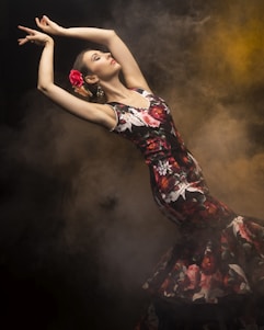 woman in black red and white floral dress