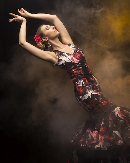 woman in black red and white floral dress