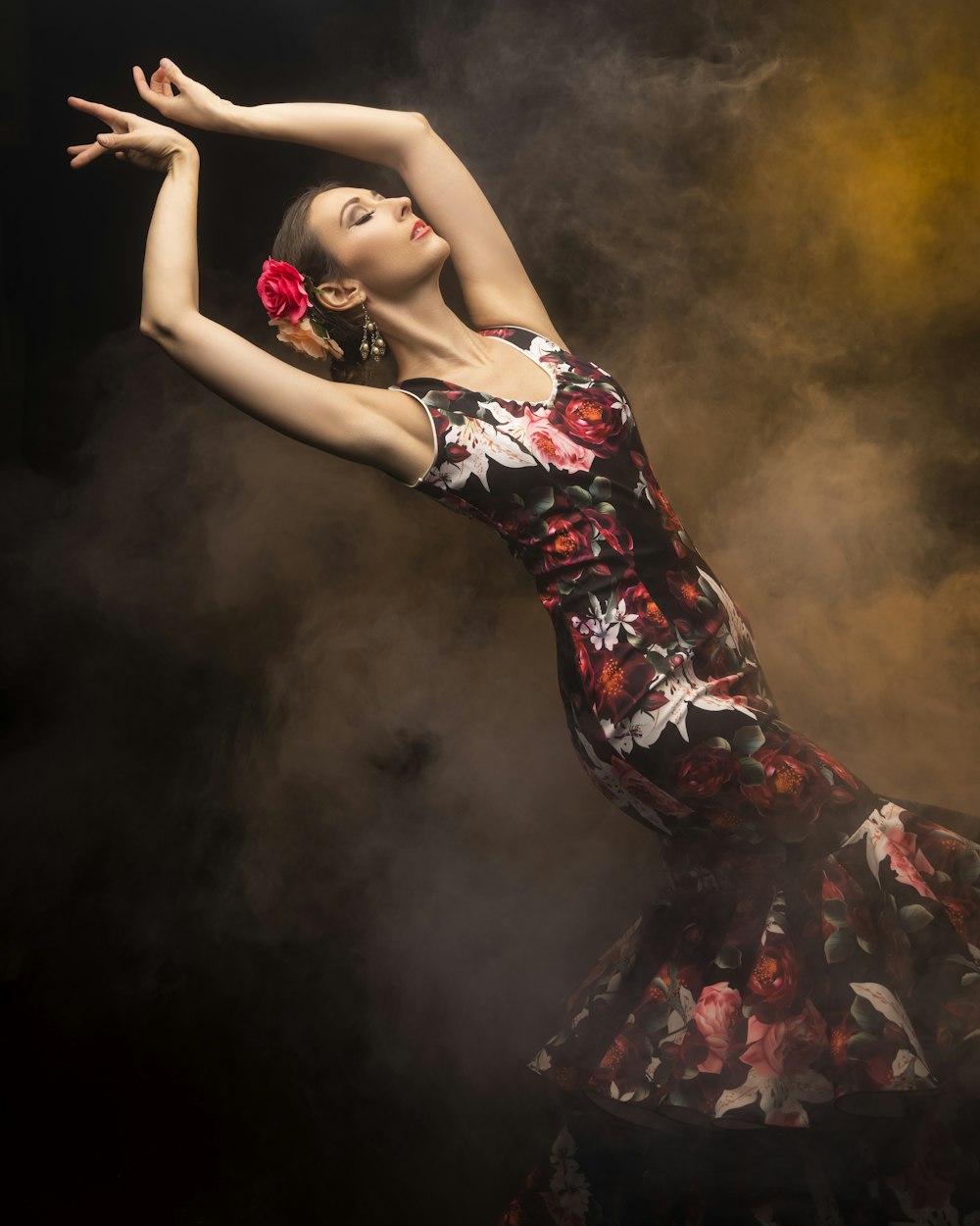 woman in black red and white floral dress