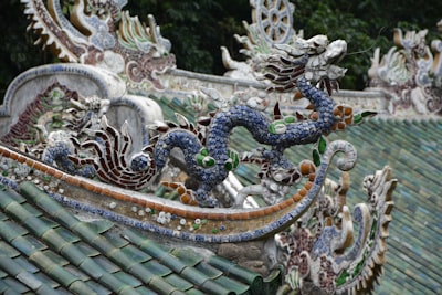 white and blue dragon statue decorative zoom background