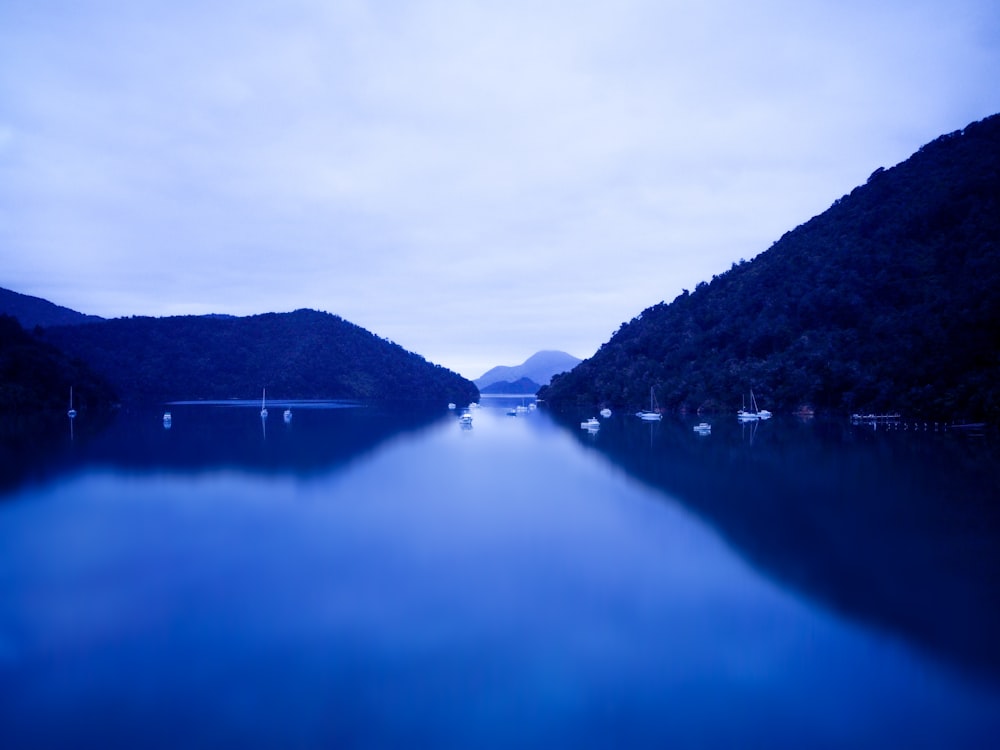 lake in the middle of mountains