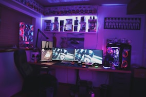 black flat screen tv on black wooden table