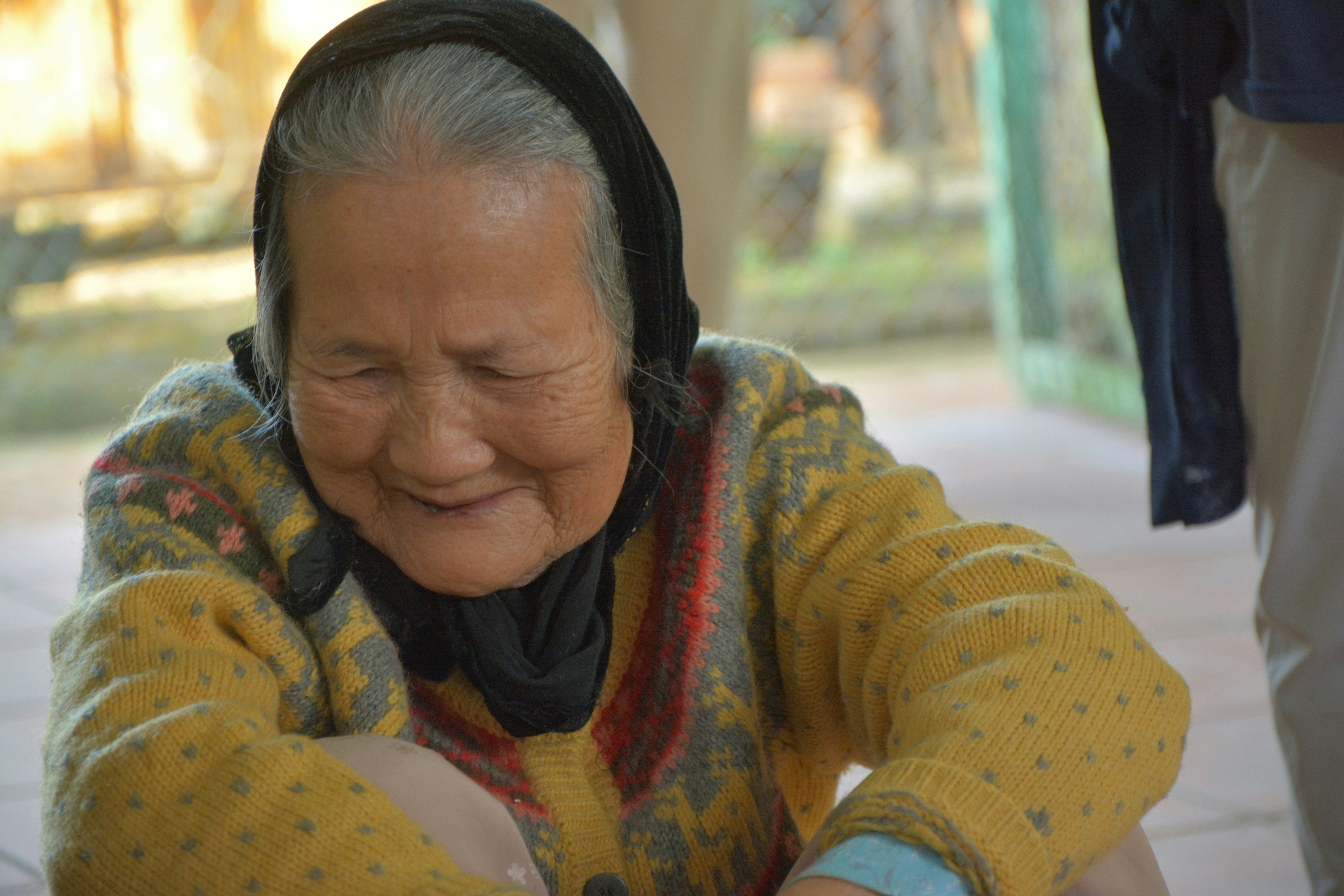 Resident smiling while using a VR headset