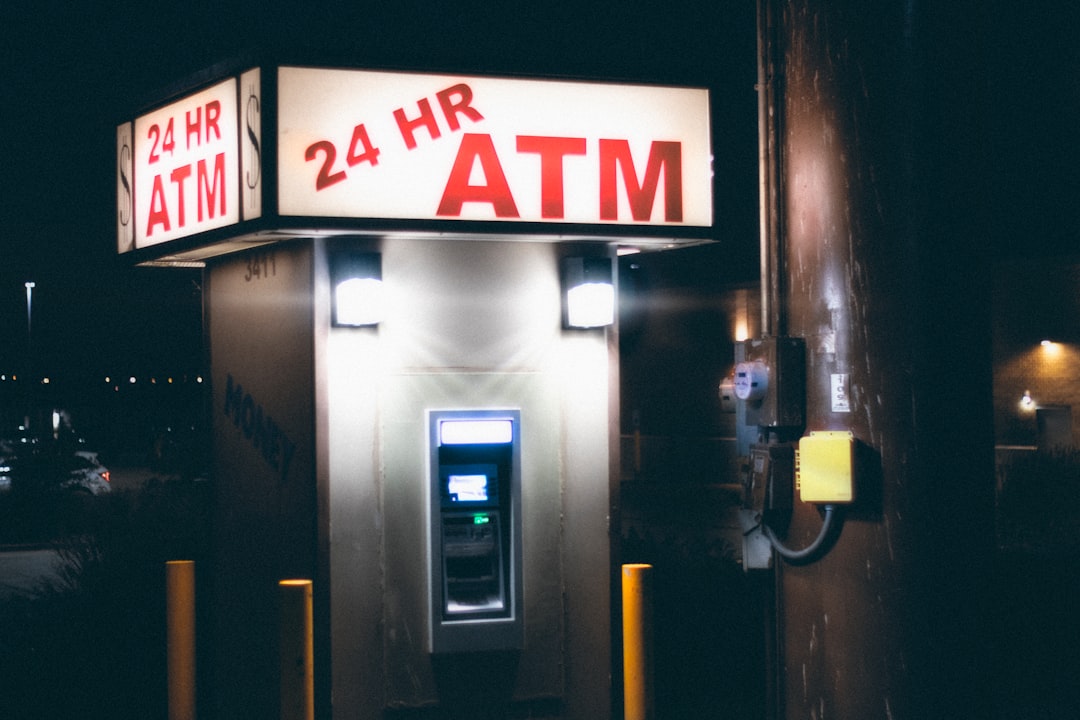 gray and black atm machine,