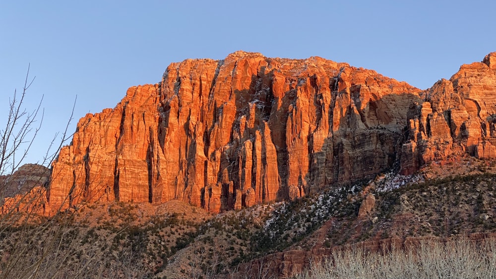 brown rocky mountain under blue sky during daytime