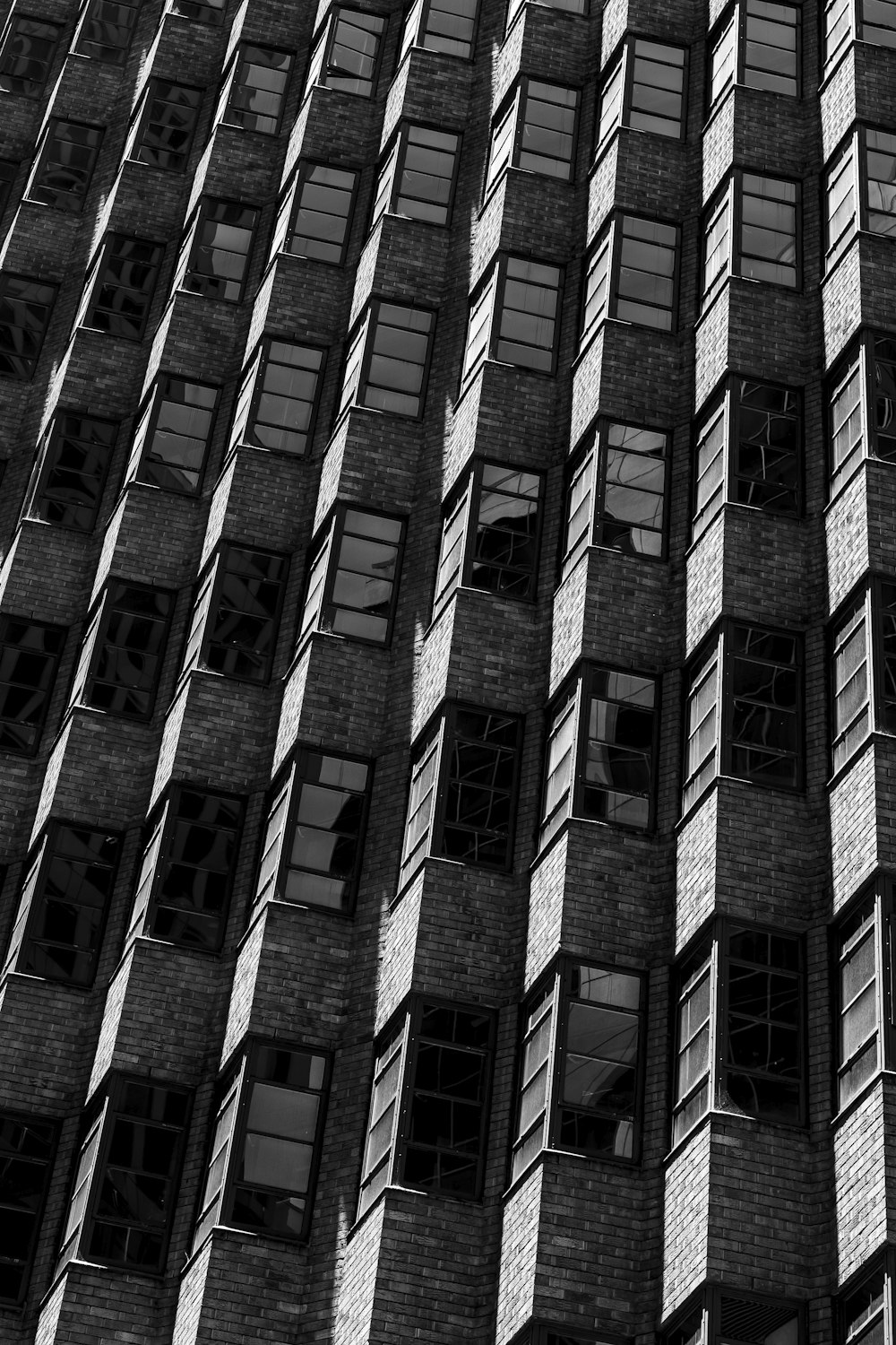 grayscale photo of concrete building