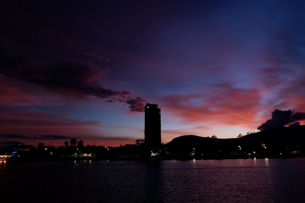 silhouette of city skyline during sunset